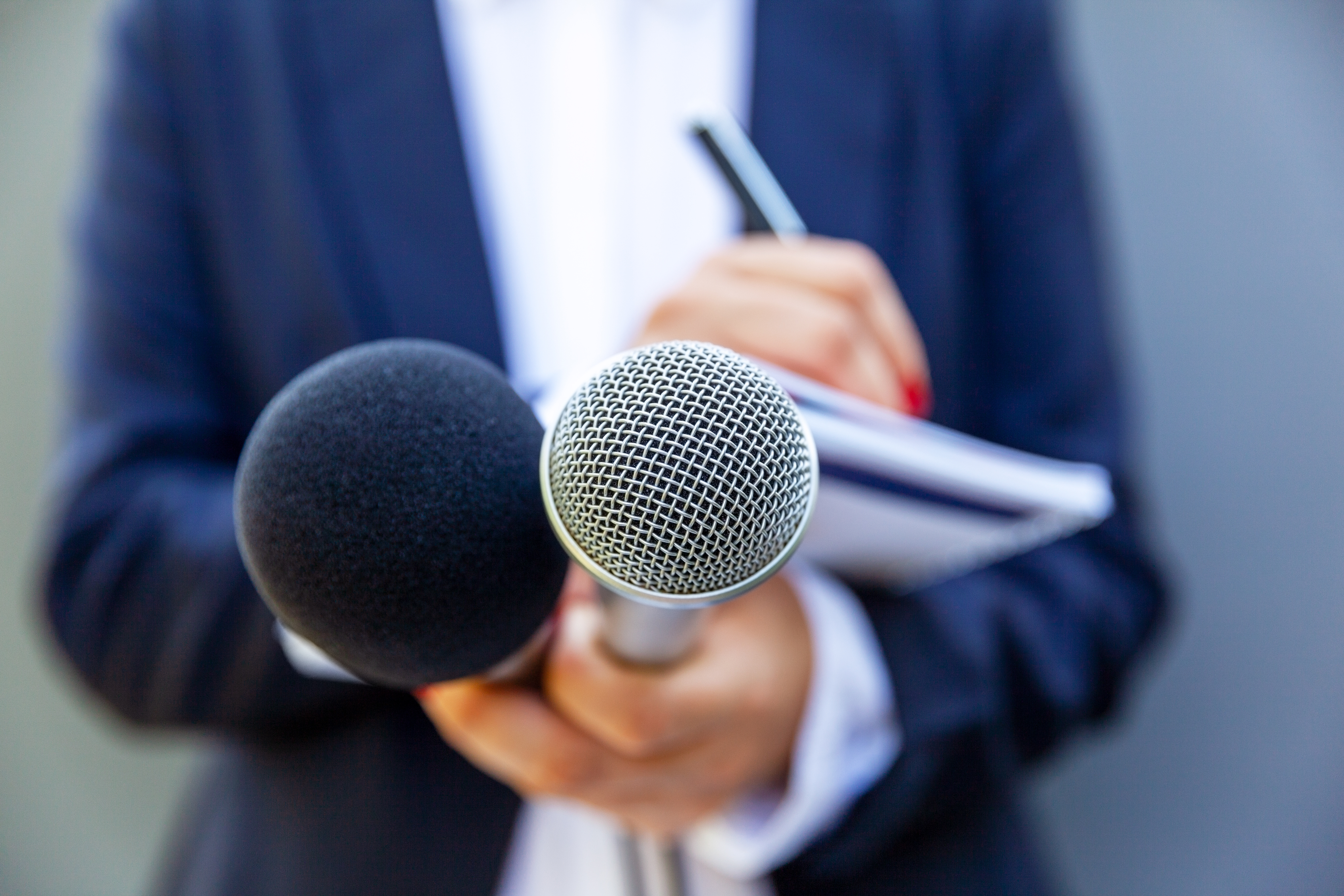A journalist conducting a media interview